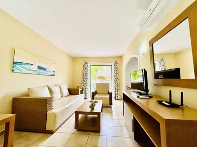 Una televisión o centro de entretenimiento en Relax Mogán vivienda vacacional