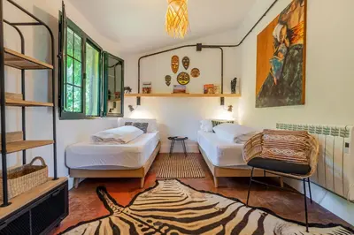 Cama o camas de una habitación en Karibu Lodge Boutique