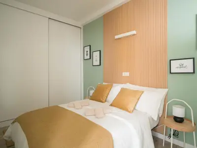 Cama o camas de una habitación en Gran apartamento con ascensor cerca playa Las Canteras BT3A