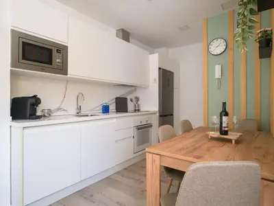 Una cocina o zona de cocina en Gran apartamento con ascensor cerca playa Las Canteras BT3A