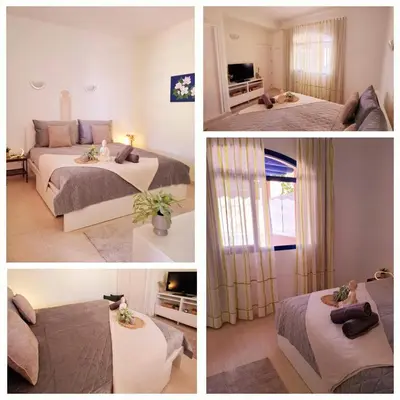Cama o camas de una habitación en Taurito Bay