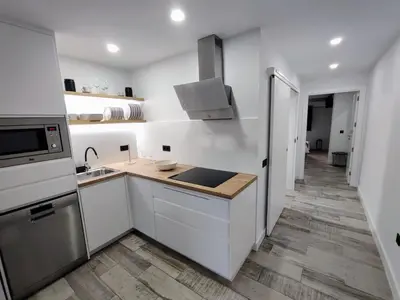 Una cocina o zona de cocina en Apartamento Playa del Águila en 1ª línea de playa