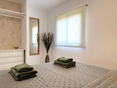 Cama o camas de una habitación en Las Olas Canarias
