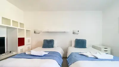 Cama o camas de una habitación en Caideros Sunset
