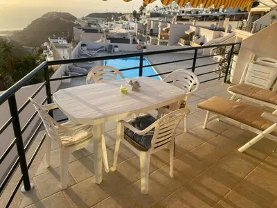 Un balcón o terraza de Beautiful sunset view apartment in Puerto Rico