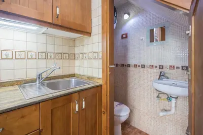 Un baño de Lightbooking Dunaflor Verde Piscina Maspalomas