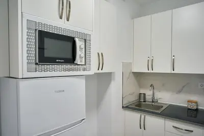 Una cocina o zona de cocina en Urban Flat in Santa Catalina - 4 min walk to beach