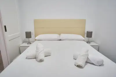 Cama o camas de una habitación en Urban Flat in Santa Catalina - 4 min walk to beach