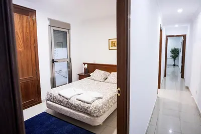 Cama o camas de una habitación en Coral Canteras Playa - Frente al mar - Ideal parejas, familias o trabajo