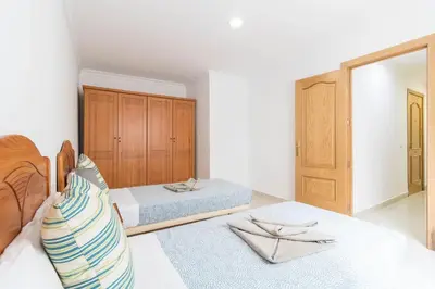 Cama o camas de una habitación en Sagasta Canteras Apartment