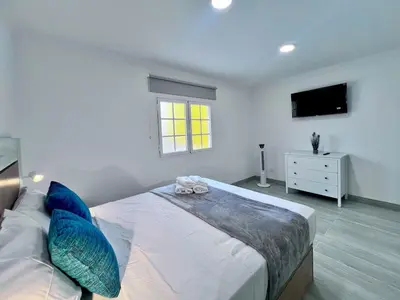 Cama o camas de una habitación en Tropical Garden