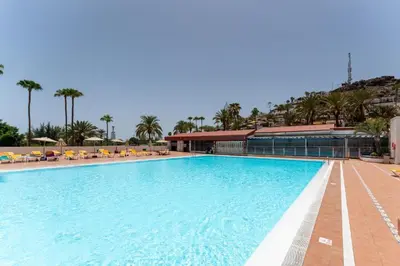Piscina en o cerca de Großzügige Ferienwohnung mit Atlantikblick in zentraler Lage Monte Rojo San Agustín