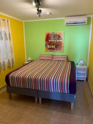 Cama o camas de una habitación en Großzügige Ferienwohnung mit Atlantikblick in zentraler Lage Monte Rojo San Agustín
