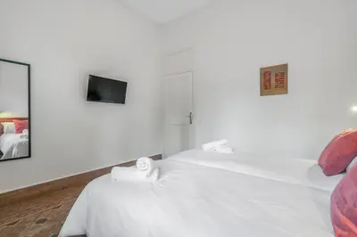 Cama o camas de una habitación en City Garden Suites Nadami 1935