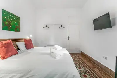 Cama o camas de una habitación en City Garden Suites Nadami 1935