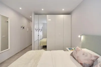 Cama o camas de una habitación en A bright and modern apartment