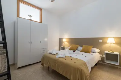 Cama o camas de una habitación en Home2Book Charming Rooftop Vibes Apartment
