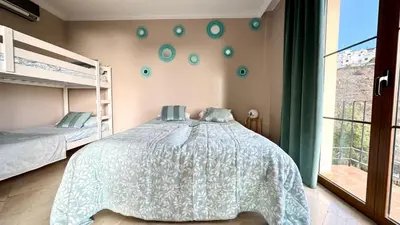 Cama o camas de una habitación en Alzado Amadores