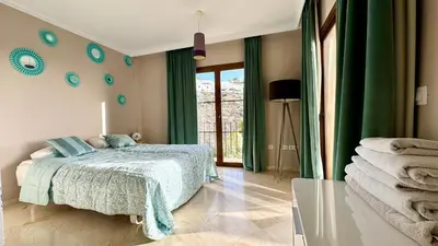 Cama o camas de una habitación en Alzado Amadores