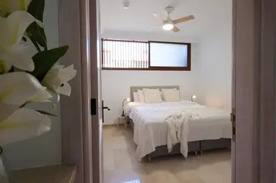 Cama o camas de una habitación en CASA BLISS - LUXURY VILLA 3 BEDROOMS TAURO GOLF Wifi MOGAN