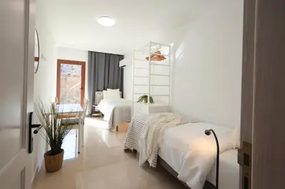 Cama o camas de una habitación en CASA BLISS - LUXURY VILLA 3 BEDROOMS TAURO GOLF Wifi MOGAN
