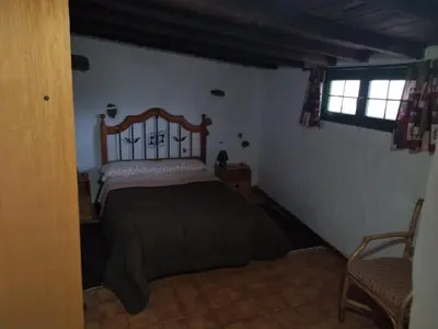 Cama o camas de una habitación en La Escuelita