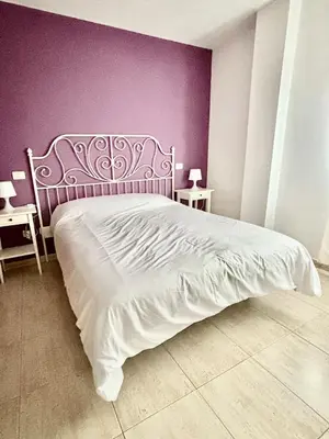 Cama o camas de una habitación en El céntrico apartamento