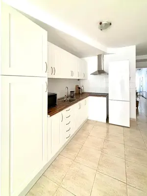Una cocina o zona de cocina en El céntrico apartamento