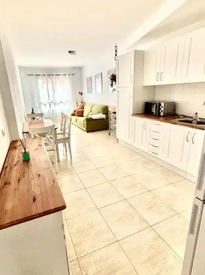 Una cocina o zona de cocina en El céntrico apartamento