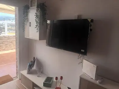 Una televisión o centro de entretenimiento en Lucas beach