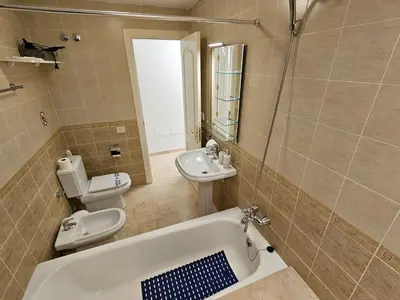 Un baño de Cozy home with terrace and access to swimming pool