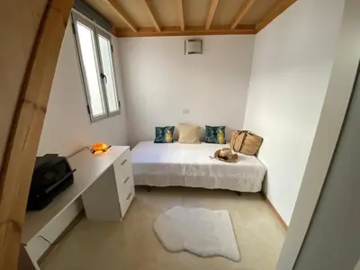 Cama o camas de una habitación en Pozo Sweet, familiar y cerca del mar