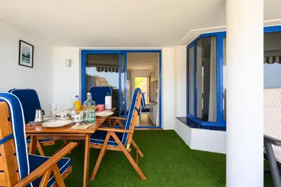 Zona de estar de Charming Apartment with Terrace, Swimming pool and Sea views