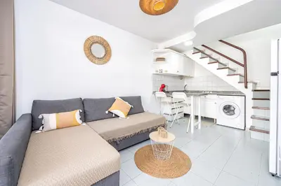 Zona de estar de DUPLEX VACACIONAL en PLAY MAR