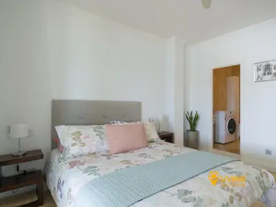 Cama o camas de una habitación en Living Las Canteras Homes - Oceanview Penthouse