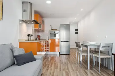 Una cocina o zona de cocina en Home2Book Bright City Apartment Las Palmas