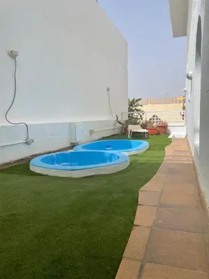 Piscina en o cerca de Suite con terraza y jacuzzi privada en Maspalomas