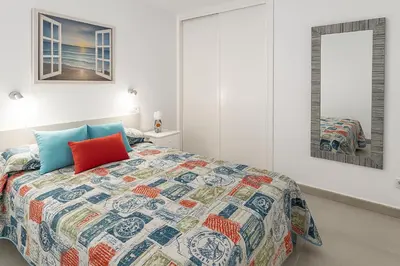 Cama o camas de una habitación en Seaside Aguila Playa 326