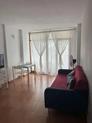 Una televisión o centro de entretenimiento en Villa Paraíso I