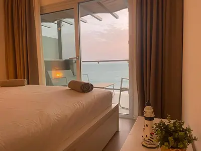 Cama o camas de una habitación en Vista Oceano Luxury Suite