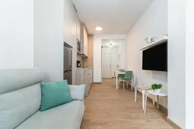 Una televisión o centro de entretenimiento en Vivelorural Sunrise Las Canteras