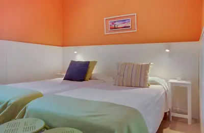 Cama o camas de una habitación en Bungalow Vegas Golf