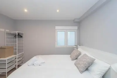 Cama o camas de una habitación en SG Simancas Plaza Apartments
