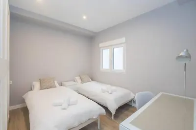 Cama o camas de una habitación en SG Simancas Plaza Apartments