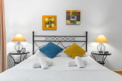 Cama o camas de una habitación en Home2Book Bright Retreat with Pool, Sardina Beach