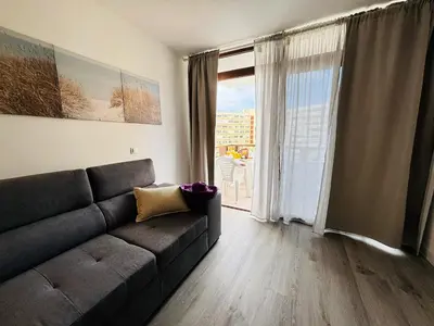 Zona de estar de Whisper Holiday Home