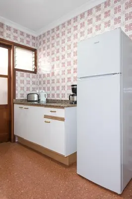 Una cocina o zona de cocina en Apartamentos las Góndolas