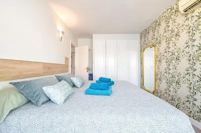 Cama o camas de una habitación en Gran Ventanal El Crucero renovado frente al Mar