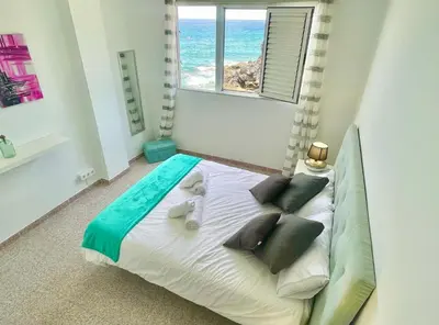 Cama o camas de una habitación en Black Rock Suit