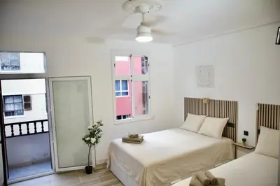 Cama o camas de una habitación en Modern Flat 6 pax Las Canteras